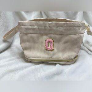 Elegant Cream Cosmetic Bag with Pink Initial